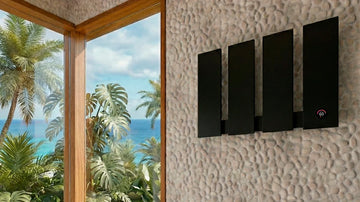 Banheiro moderno com toalheiro térmico Thermolux em inox mantendo as toalhas sempre secas e prontas para uso.